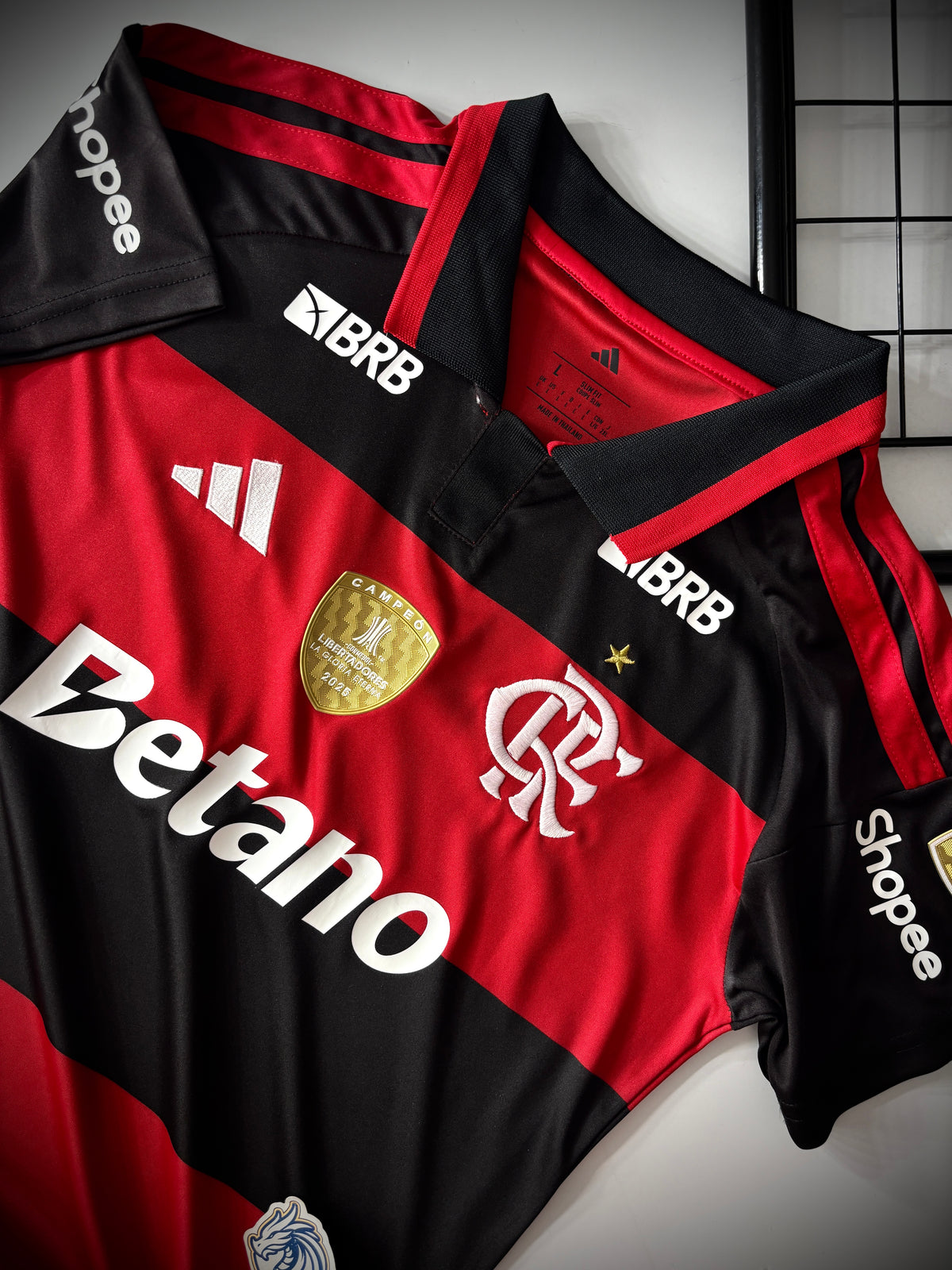 CAMISA FEMININA FLAMENGO I 2026/27